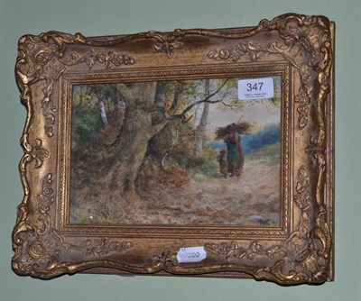 Lot 347 - A small framed watercolour, two figures on a country path collecting wood