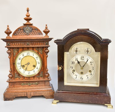 Lot 143 - A German Oak Cased Striking Mantel Clock,...