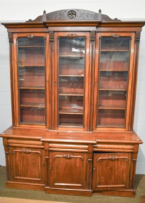 Lot 1311 - A Victorian Mahogany Breakfront Bookcase,...