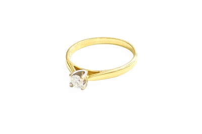 Lot 253 - An 18 Carat Gold Diamond Solitaire Ring, the...