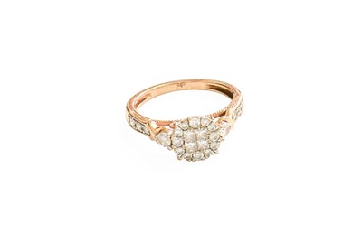 Lot 266 - A 9 Carat Gold Diamond Cluster Ring, four...