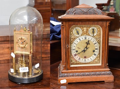 Lot 1353 - A German Carved Oak Chiming Table Clock, circa...