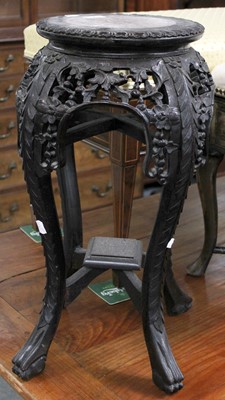 Lot 1141 - A Chinese Carved Hardwood Marble Top Plant...