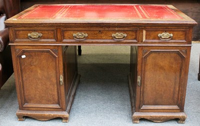 Lot 1113 - A Red Leather Inset Oak Pedestal Desk, 122cm...