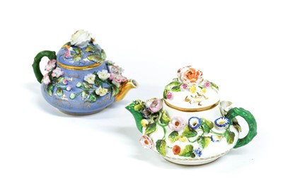 Lot 85 - A Rockingham Porcelain Toy Teapot and Cover,...