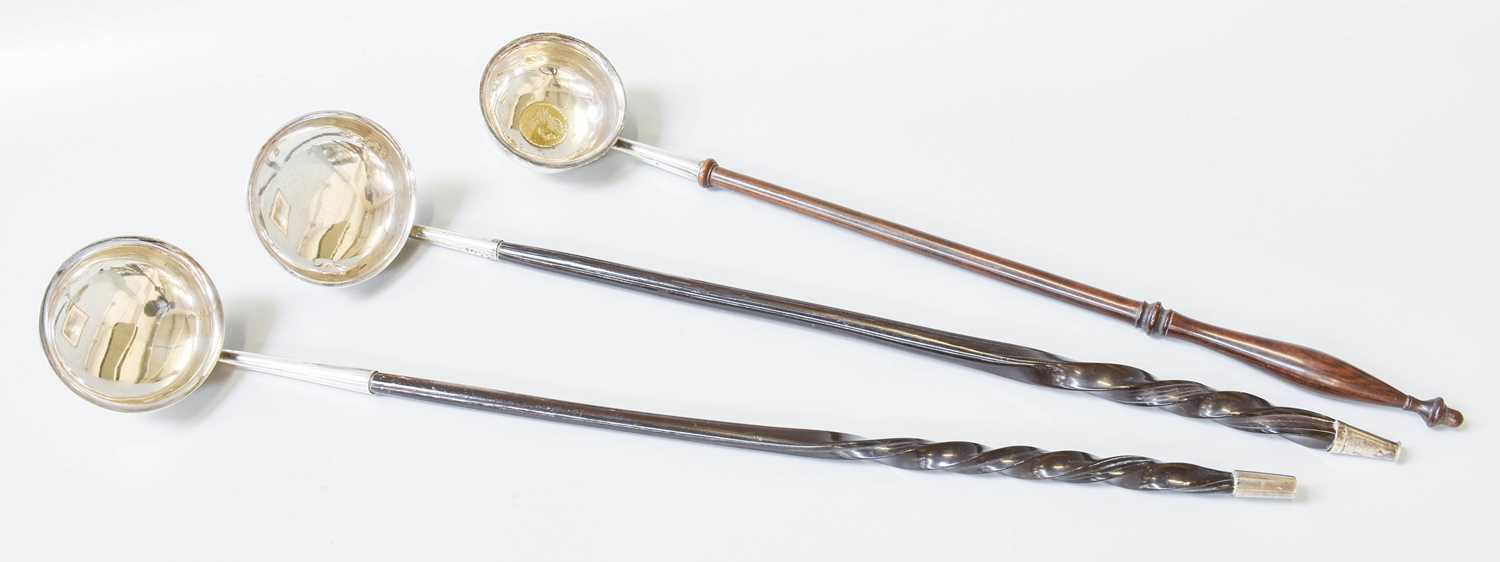 Lot 163 - Two George III Silver-Mounted Toddy-Ladles and...