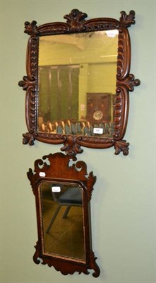 Lot 390 - Carved mahogany wall mirror and a fret carved mahogany wall mirror (2)