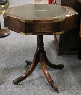 Lot 1106 - A Leather Top Octagonal Table, with brass...