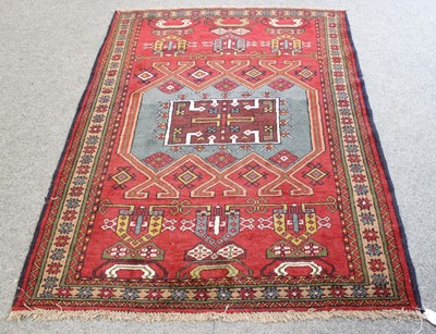 Lot 196 - North West Persian Kurdish Rug, the blood red...