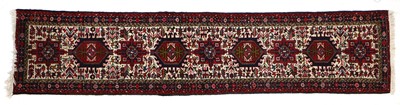 Lot 1025 - Narrow Karajah Runner, modern The column of...