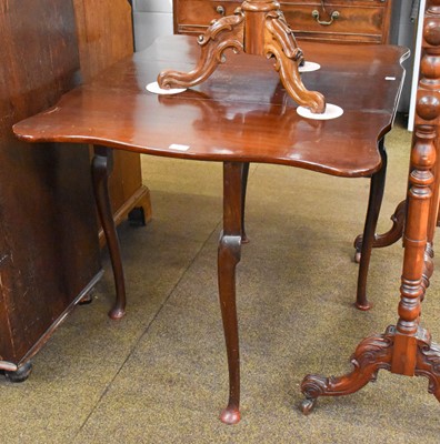 Lot 1304 - An 18th Century Drop Leaf Table, with shaped...