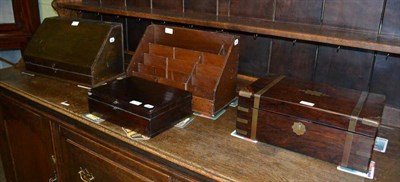 Lot 406 - A rosewood brass bound travelling box, two stationery racks and a box (4)