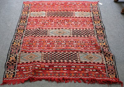 Lot 1009 - Berber Moroccan Flat Woven Rug, the faded...