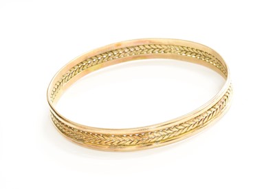 Lot 283 - A 9 Carat Gold Bangle, inner measurement 6.5cm...