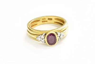 Lot 281 - An 18 Carat Gold Ruby and Diamond Ring, the...