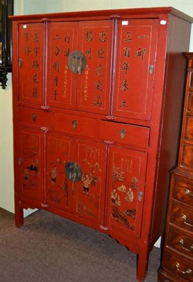 Lot 409 - Red painted Chinese three drawer cupboard