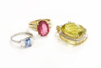 Lot 285 - A 9 Carat Gold Coated Topaz Ring, finger size...