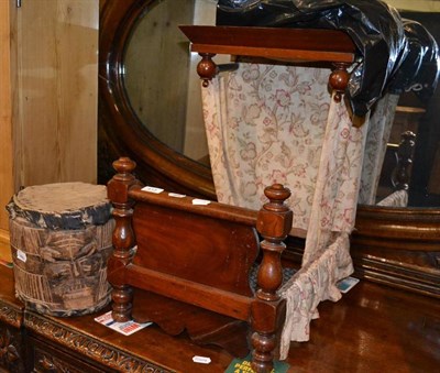 Lot 413 - Victorian mahogany half tester bed with covers and an ethnographic drum carved with a face (2)