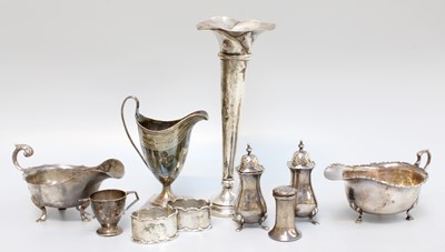Lot 102 - A Collection of Assorted Silver, including two...