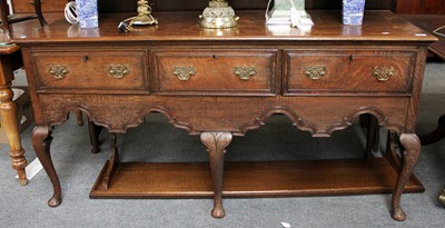 Lot 1269 - An Oak Three Drawer Dresser Base, 163cm by...