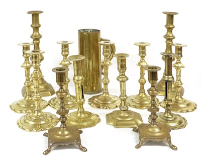 Lot 301 - A Group of 18th and 19th Century Candlesticks,...