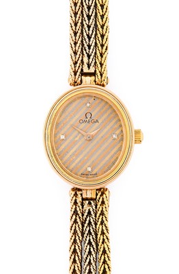 Lot 2316 - Omega: A Lady's 18 Carat Gold Wristwatch,...