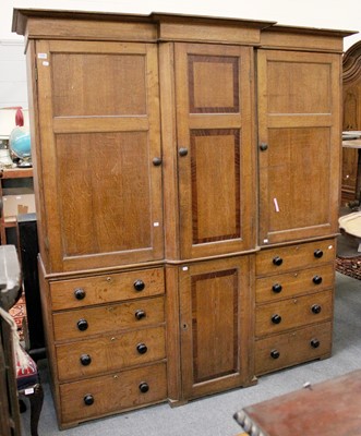 Lot 1236 - A Late Victorian Oak Breakfront Compactum,...