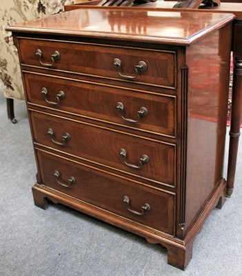 Lot 1252 - A Small Reproduction Crossbanded Mahogany Four...