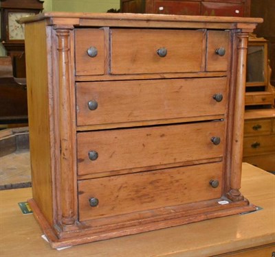 Lot 436 - A pine six drawer table cabinet