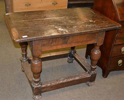 Lot 437 - A 16th/17th century plank top oak table