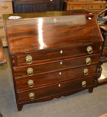 Lot 438 - A 19th century mahogany bureau