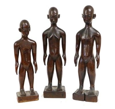 Lot 246 - A Set of Three East African Wood Figures,...