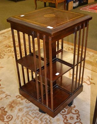 Lot 447 - A mahogany reproduction revolving bookcase