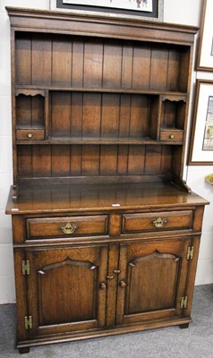 Lot 1411 - A Tichmarsh & Goodwin Oak Dresser and Rack,...