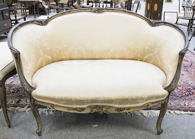 Lot 1395 - A French Louis XV Style Walnut Settee, with...