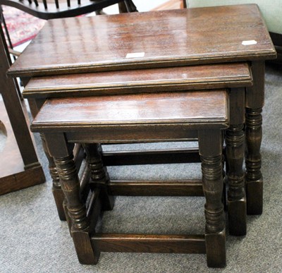 Lot 1403 - A Nest of Three Solid Oak Tables, largest 58cm...