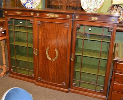 Lot 453 - An Empire-style mahogany breakfront bookcase with gilt metal mounts