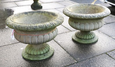 Lot 695 - A Pair of Reconstituted Stone Garden Urns, of...