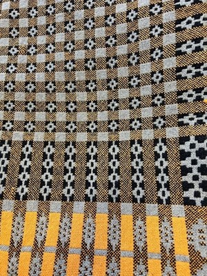 Lot 2087 - A Welsh Wool Blanket in cream, yellow and...