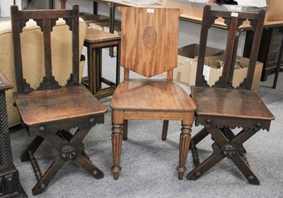 Lot 1427 - A Pair of Oak Hall Chairs with x-form supports...