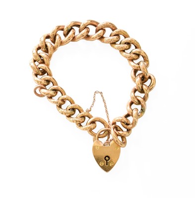 Lot 403 - A Curb Link Bracelet, the textured and plain...
