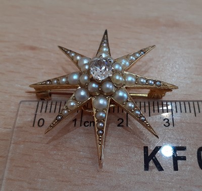 Lot 2143 - A Late 19th Century Diamond and Split Pearl...