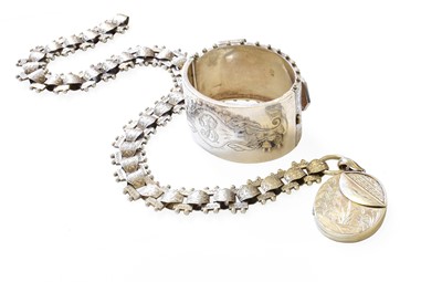 Lot 430 - A Victorian Silver Locket on Chain, the oval...