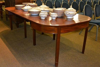 Lot 473 - George III mahogany dining table