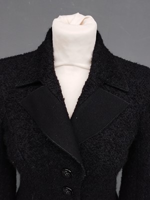 Lot 1097 - Chanel Black Boucle Wool and Mohair Fitted...