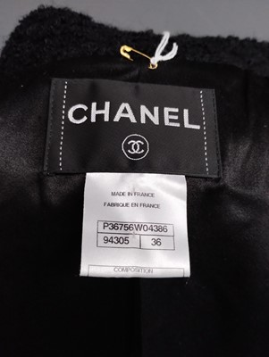 Lot 1097 - Chanel Black Boucle Wool and Mohair Fitted...