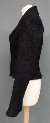 Lot 1097 - Chanel Black Boucle Wool and Mohair Fitted...