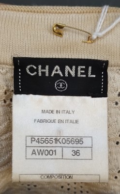 Lot 1096 - Chanel Clothing comprising a cream cotton...