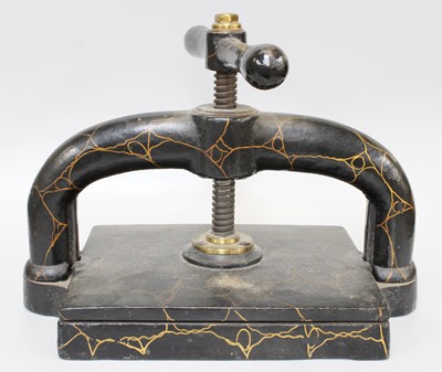Lot 303 - A Victorian Cast Iron Bookpress, with marbled...