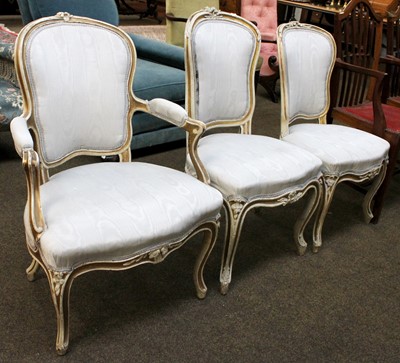 Lot 1288 - A French Louis XVI Style Cream Painted and...